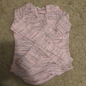 Laced long sleeved shirt.